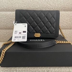 Caviar quilled Chanel boy wallet on a chain